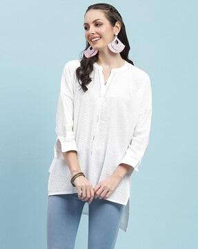 flared tunic with high-low hem