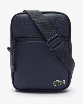 flat crossbody bag with adjustable shoulder strap