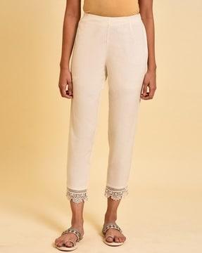 flat-front pants with lace trims