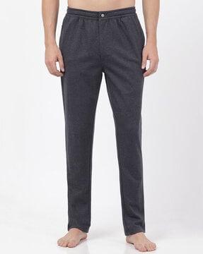 flat-front pants with mid-rise waist