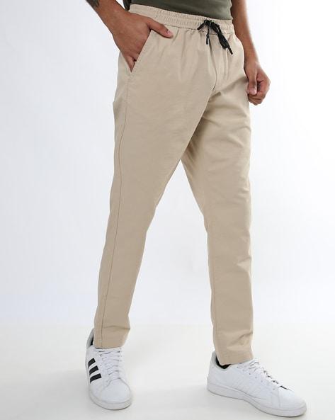 flat-front slim tapered fit trousers