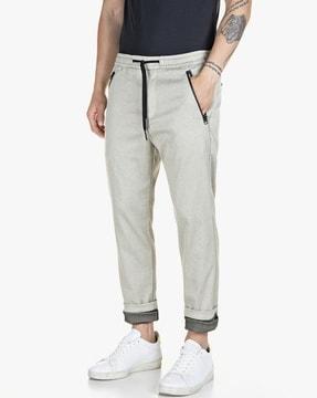 flat-front slim trousers with front zipper pockets