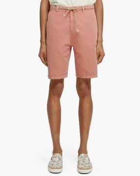 flat-front city shorts with belt