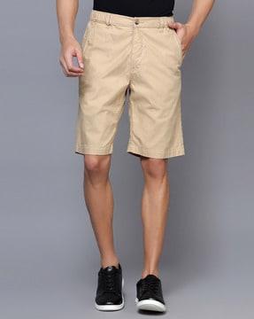 flat-front city shorts with insert pockets