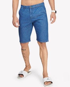 flat-front denim shorts with insert pockets