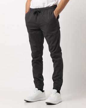 flat-front joggers with drawstring fastening