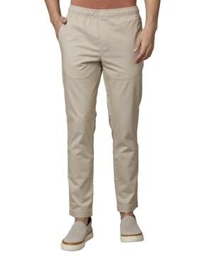 flat-front pants with insert pockets