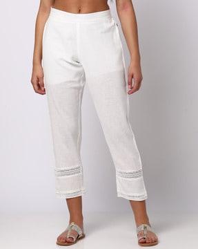 flat-front pants with lace inserts