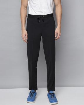 flat-front relaxed fit trousers