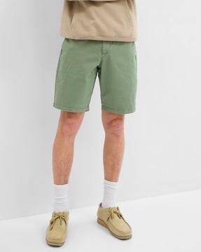 flat-front shorts with button closure