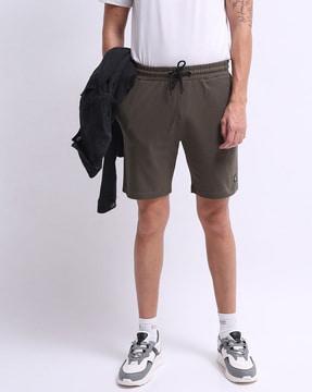 flat-front shorts with drawstring waistband