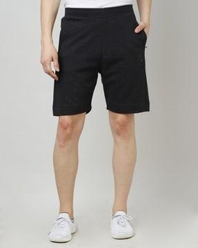 flat-front shorts with pockets