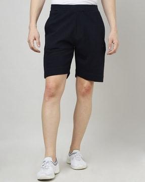 flat-front shorts with pockets