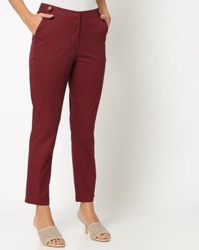 flat-front tapered fit trousers with insert pockets