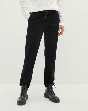 flat-front trousers with elasticated drawstring waist