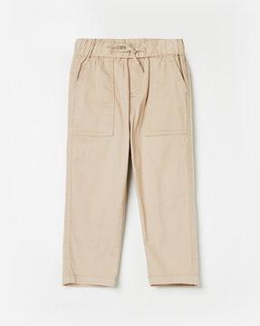 flat-front trousers with elasticated waistband