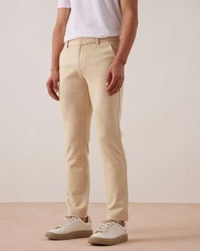 flat-front trousers with fixed waist