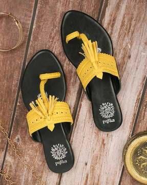 flat sandals with tassels