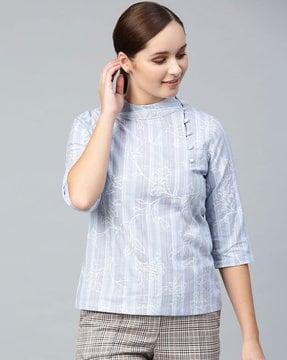 floral print blouse with button-loop closure