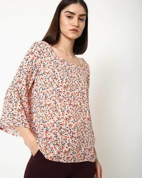 floral print top with flared sleeves