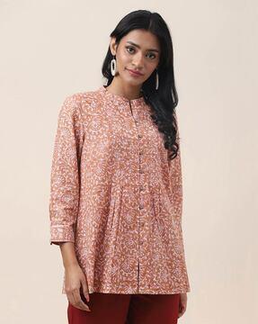 floral print tunic with pleated pintuck detail