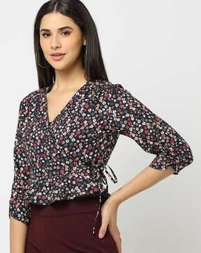 floral cross-over peplum top