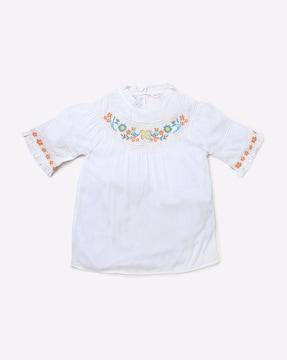 floral-embroidered top with ruffled hems
