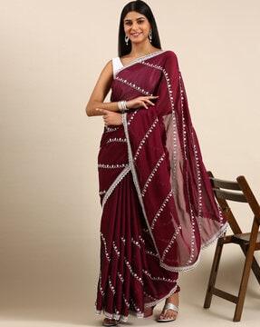 floral embroidered saree with lace border