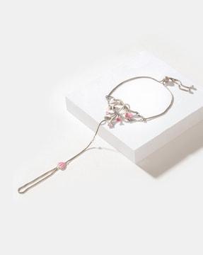 floral enamelled finger linked bracelet