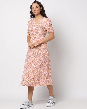 floral print dress with rouching detail