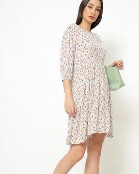 floral print high-low tunic with bishop sleeves