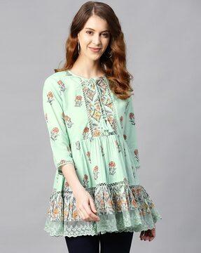 floral print peplum top with tie-up neckline