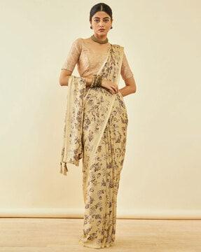 floral print saree with tassels