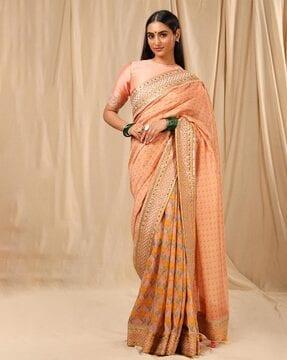 floral print saree with tassles