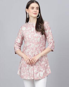 floral print shirt with roll-up sleeves