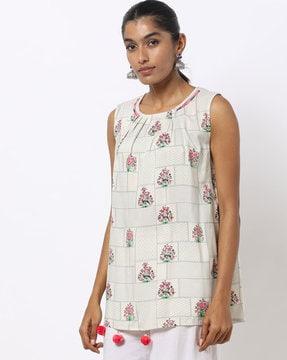 floral print sleeveless tunic with pom poms