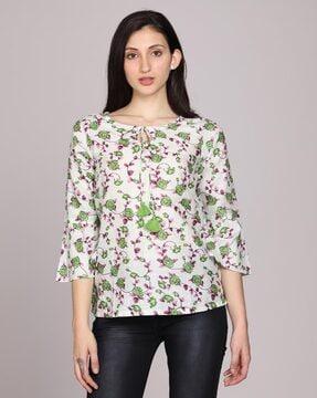 floral print top with bell sleeves
