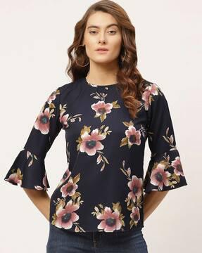 floral print top with bell sleeves