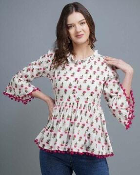 floral print top with bell sleeves