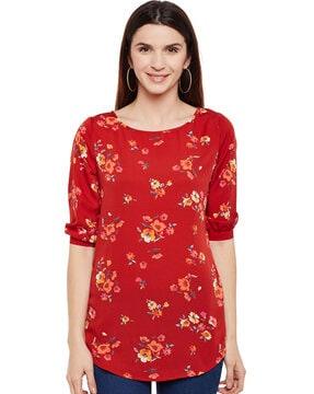 floral print top with curved hemline