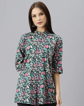 floral print top with curved hemline