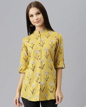 floral print top with curved hemline