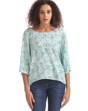 floral print top with dipped hemline