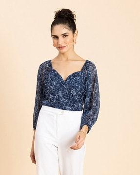 floral print top with puffed sleeves