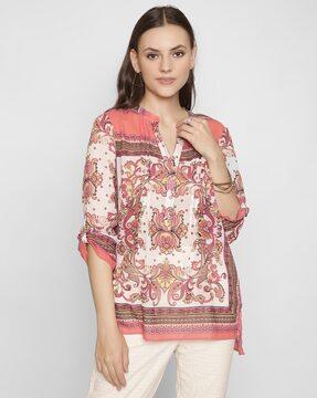 floral print top with roll-up sleeves