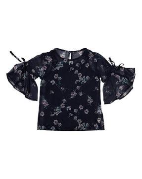 floral print top with ruffle details