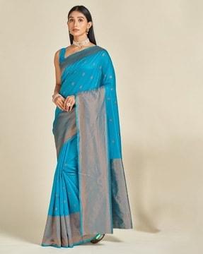 floral woven kanjeevaram saree with contrast border