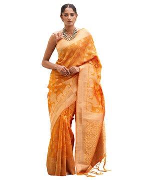 floral woven saree with contrast border & tassels