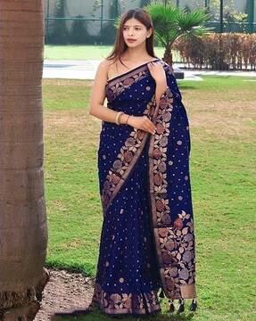 floral woven saree with tassel accent