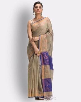 floral woven saree with tassels